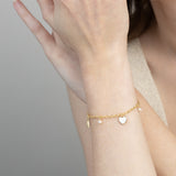 Pulseira delicada banhada a ouro com zircónia, pérola e esmalte branco