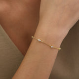 Pulseira delicada banhada a ouro com zircónia