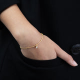 Pulseira delicada banhada a ouro com zircónia