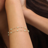 Pulseira dupla banhada a ouro com cristais