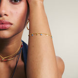 Pulseira  olhos banhada a ouro com esmalte azul