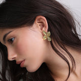 Brincos de placa banhados a ouro com flor