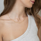 Colar banhado a ouro com pendentes esfera