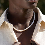 Colar de pérolas banhado a ouro