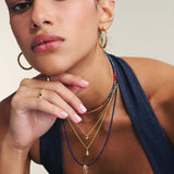 Colar de pedra peixes banhados a ouro com cristais