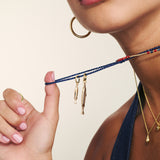 Colar de pedra peixes banhados a ouro com cristais