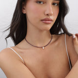 Colar choker banhado a ouro com zircónia e cristal violeta