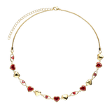 Choker banhado a ouro com corações e granada vermelha