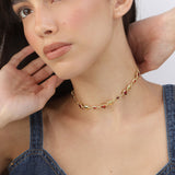 Choker banhado a ouro com corações e granada vermelha