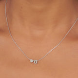Fio com pendente "G" e coração em prata 925