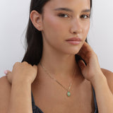 Colar banhado a ouro com pendente oval de quartzo verde e zircónia rosa