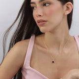 Colar com pendente coração banhado a ouro com cristal vermelho