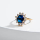 Anel banhado a ouro com zircónia azul