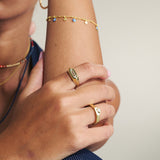 Anel banhado a ouro com zircónias