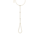 Pulseira de mão com zircónias transparentes banhada a ouro